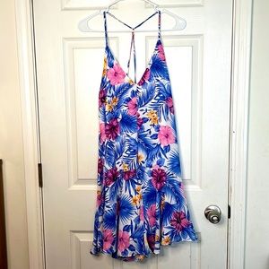 Fun floral dress by Iggy and Lola. Light weight, flowy.